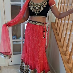 Pink, black, and gold lengha